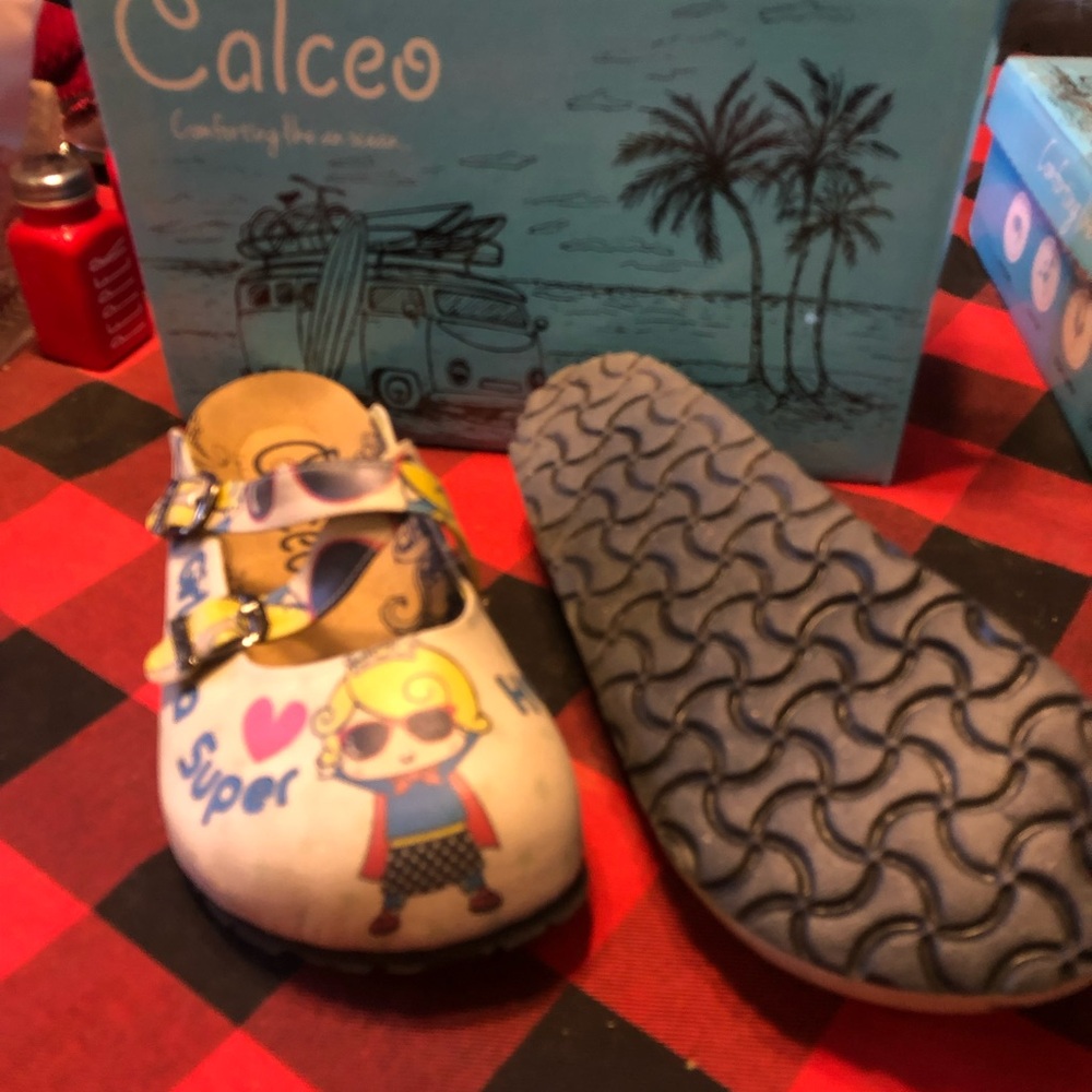 Calceo Yellow and Blue Mules with Textured Sole by Calceo. Super Girl
